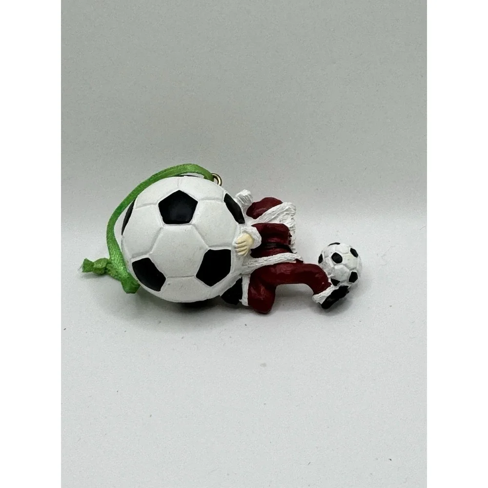 SANTA PLAYING SOCCER SOCCER BALLS Vintage‎ Christmas Ornament RESIN Vintage Coll